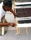 Maldives: Preparing a traditional loom for weaving a <i>feyli</i> or Maldivian sarong, Eydhafushi Island, South Maalhosmadulu Atoll (Baa Atoll), 1980