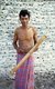 Maldives: A man holds a simple indigenous percussion instrument, Addu Atoll (Seenu Atoll) 1980