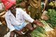 Sri Lanka: Vegetable vendor in a Kandy fresh market