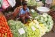 Sri Lanka: A vegetable vendor in a fresh produce market in Kandy