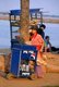 Cambodia: Young cola vendor near the confluence of the Sap and Mekong rivers, Phnom Penh