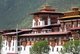 The Punakha Dzong, also known as Pungtang Dewa chhenbi Phodrang ('the palace of great happiness or bliss') was built in 1637 - 1638 by the 1st Zhabdrung Rinpoche and founder of the Bhutanese state, Ngawang Namgyal (1594 - 1651). It is the second largest and second oldest dzong (fortress) in Bhutan, located at the confluence of the Pho Chhu (father) and Mo Chhu (mother) rivers in the Punakha-Wangdue valley.<br/><br/>

Punakha Dzong is the administrative centre of Punakha District, and once acted as the administrative centre and the seat of Bhutan's government until 1855, when the capital was moved to Thimphu, though it still acts as the winter capital for the head of the Bhutanese clergy. It houses sacred relics from the southern Drukpa Lineage of the Kagyu school of Tibetan Buddhism.