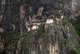 Paro Taktsang, also known by the names Taktsang Palphug Monastery and the Tiger's Nest, is a major Buddhist sacred site and temple complex built into the 1,000-metre (3,281-foot) cliffside of the upper Paro valley in Bhutan. The elegant structure is perhaps the most well known cultural icon of Bhutan.<br/><br/>

The monastery first began construction in 1692 around Taktsang Senge Samdup, a cave where the 8th-century Buddhist sage Padmasambhava, also known as Guru Rinpoche, was said to have meditated in for three years, three months, three days and three hours; Guru Rinpoche is credited for introducing Buddhism to Bhutan, acting as a tutelary deity for the country.<br/><br/>

The name Taktsang, which literally translates to "Tigress Lair", comes from the supposed fact that Guru Rinpoche flew to the cave from Tibet on the back of a tigress, who in some legends is said to have been the former wife of an emperor and a disciple of the Guru, named Yeshe Tsogyal.