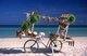 Cuba: A handicraft vendors bicycle on a beach on Cayo Santa María, Jardines del Rey, Villa Clara Province