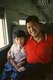 Burma / Myanmar: A Kachin jade merchant and his daughter on the train to Myitkyina, Kachin State (1997)