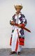 Burma / Myanmar: A Rawang man in traditional costume with a ceremonial sword. There is a great variety of costumes amongst groups considered 'Kachin', Kachin State (1997)