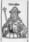 Rudolf I (1218-1291), also known as Rudolf of Habsburg, was the son of Count Albert IV of Habsburg, and became count after his father's death in 1239. His godfather was Emperor Frederick II, to whom he paid frequent court visits. Rudolf ended the Great Interregnum that had engulfed the Holy Roman Empire after the death of Frederick when he was elected as King of Germany in 1273.<br/><br/>

Rudolf secured the recognition of the Pope by promising to launch a new crusade and renouncing all imperial rights to Rome, the papal territories and Sicily. His main opponent was King Ottokar II of Bohemia, who had refused to acknowledge Rudolf as King of Germany. War was declared against Ottokar in 1276, and he was defeated and killed in 1278 during the Battle on the Marchfeld.<br/><br/>

Rudolf was ultimately not entirely successful in restoring internal peace throughout the Holy Roman Empire, lacking the power, resources and determination to truly enforce his established land peaces, with the princes largely left to their own devices. He died in 1291, establishing the powerful Habsburg dynasty but unable to ensure the succession of his son Albert as German king.