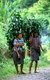 Burma / Myanmar:  A Kachin man and woman returning home after gathering medicinal plants in the forest, Kachin State (1997)