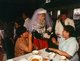 Burma / Myanmar: A Jinghpaw (Kachin) bride and her new husband offer guests a piece of cake at their wedding reception, YMCA hall, Myitkyina,  Kachin State (1997)