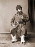 Sher Ali Khan (c. 1825-1879) was the third son of Dost Mohammed Khan, founder of the Barakzai Dynasty in Afghanistan, and served as Amir of Afghanistan from 1863 to 1866. He had seized power after his father's death, but was soon ousted from the throne by his older brother, Mohammad Afzhal Khan. Sher Ali waged a civil war against his brother, and defeated him to return to power in 1868, regaining the title of Amir.<br/><br/>

Under Sher Ali Khan's rule, Afghanistan faced constant pressure from both Britain and Russia, who were waging the Great Game for influence over the region. Sher Ali's attempts to remain neutral fell apart when the British invaded during the Second Anglo-Afghan War in 1878. Sher Ali fled from Kabul to try and seek political asylum in Russia, and died a year later in Mazar-e Sharif.