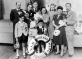 Japan: An extended family of Jewish refugees fleeing from Nazi persecution in Europe aboard the Japanese ocean liner Hikawa Maru (1940).<br/><br/>

In 1940–41, before Japan's entry into the Second World War, hundreds of Jewish refugees fled from Nazi persecution to Canada and the USA via Japan, and many of them sailed on Hikawa Maru. In August 1940 a party of 82 German and Lithuanian Jews who had travelled via the USSR and Vladivostok reached Seattle on Hikawa Maru.