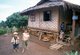 Burma / Myanmar: Village boys and house near Pyin U Lwin (Maymyo), Mandalay Region (1997)