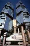 China: The twin towers of the Bond Centre (now known as the Lippo Centre) were completed in 1988 at 89 Queensway, Admiralty, Hong Kong (1987).<br/><br/>

Originally a sparsely populated area of farming and fishing villages, Hong Kong has become one of the world's most significant financial centres and commercial ports. It is the world's tenth-largest exporter and ninth-largest importer.<br/><br/>

Hong Kong became a colony of the British Empire after the Qing Empire ceded Hong Kong Island at the end of the First Opium War in 1842.