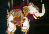 Burma / Myanmar: A traditional Burmese elephant puppet (Yoke thé) on sale, Bogyoke Aung San Market, Yangon (Rangoon). Yoke thé (lit. miniatures) is the Burmese name for marionette puppetry. Although the term can be used for marionettery in general, its usage usually refers to the local form of string puppetry. Like most of Burmese refined art, Yoke thé performances originated from Royal patronage and were gradually adapted for the wider populace. Yoke thé are almost always performed in operas.