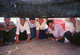Burma / Myanmar: A group of young men looking inside the giant Mingun Bell in Sagaing Division, Burma