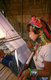 Thailand: Padaung (Long Neck Karen) girl weaving, Chiang Mai Province, northern Thailand