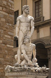 Italy: A marble statue portraying 'Hercules and Cacus', Piazza della Signoria, Florence. Sculpted by Baccio Bandinelli (1488 - 1560) between 1525 and 1534. Hercules is seen here subduing and later killing the fire-belching monster Cacus who had been stealing cattle. This was during the completion of Hercules' tenth labour.
