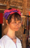 Thailand: A Padaung (Long Neck Karen) woman after removing her neck rings for cleaning, village near Mae Hong Son. The Padaung or Kayan Lahwi or Long Necked Karen are a subgroup of the Kayan, a mix of Lawi, Kayan and several other tribes. Kayan are a subgroup of the Red Karen (Karenni) people, a Tibeto-Burman ethnic minority of Burma (Myanmar).