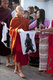 Burma / Myanmar: Buddhist monks receive donations from local townspeople, Kyaing Tong (Kengtung), Shan State